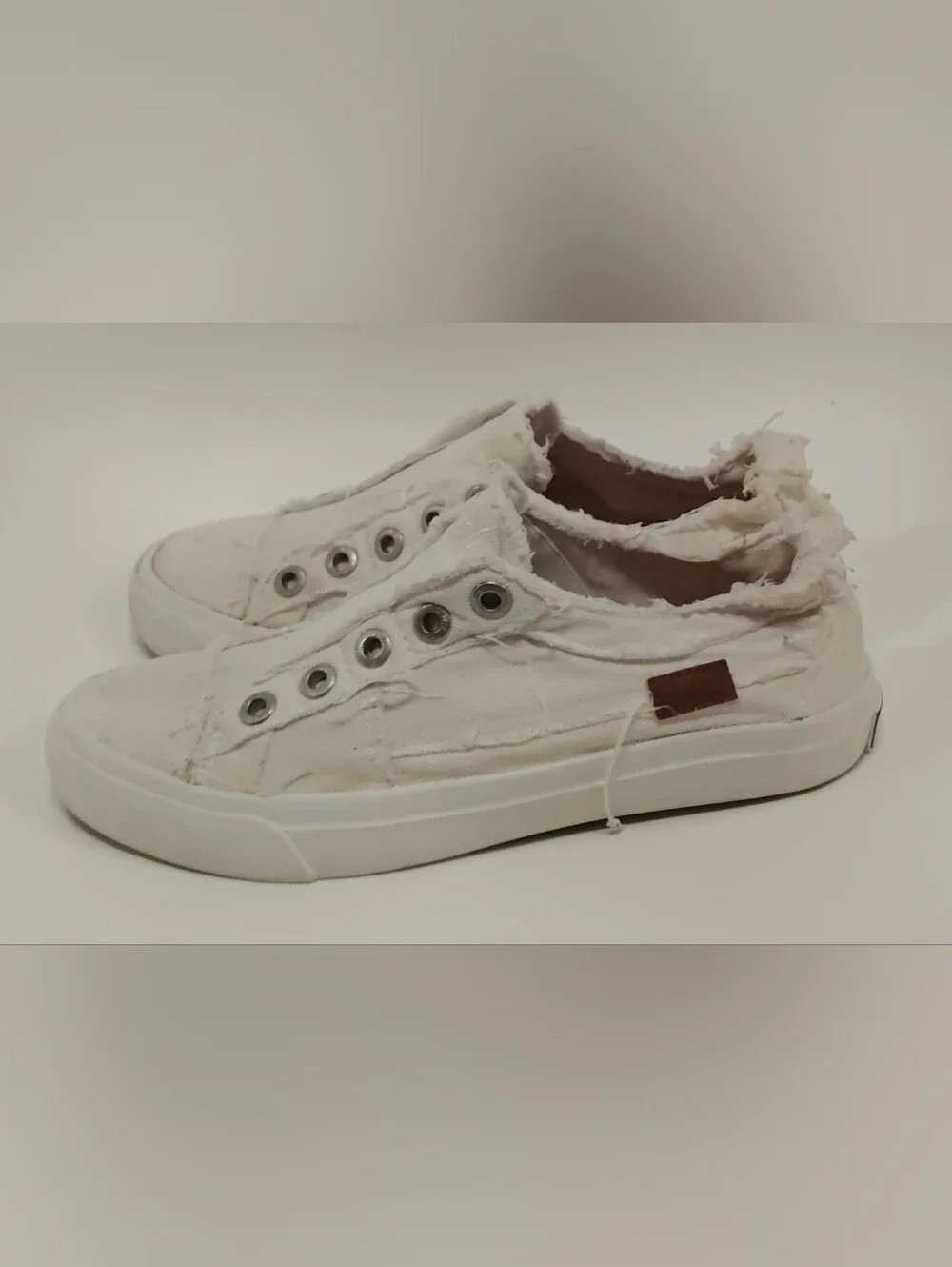 Women's White Canvas Slip-On Sneakers with Frayed Trim